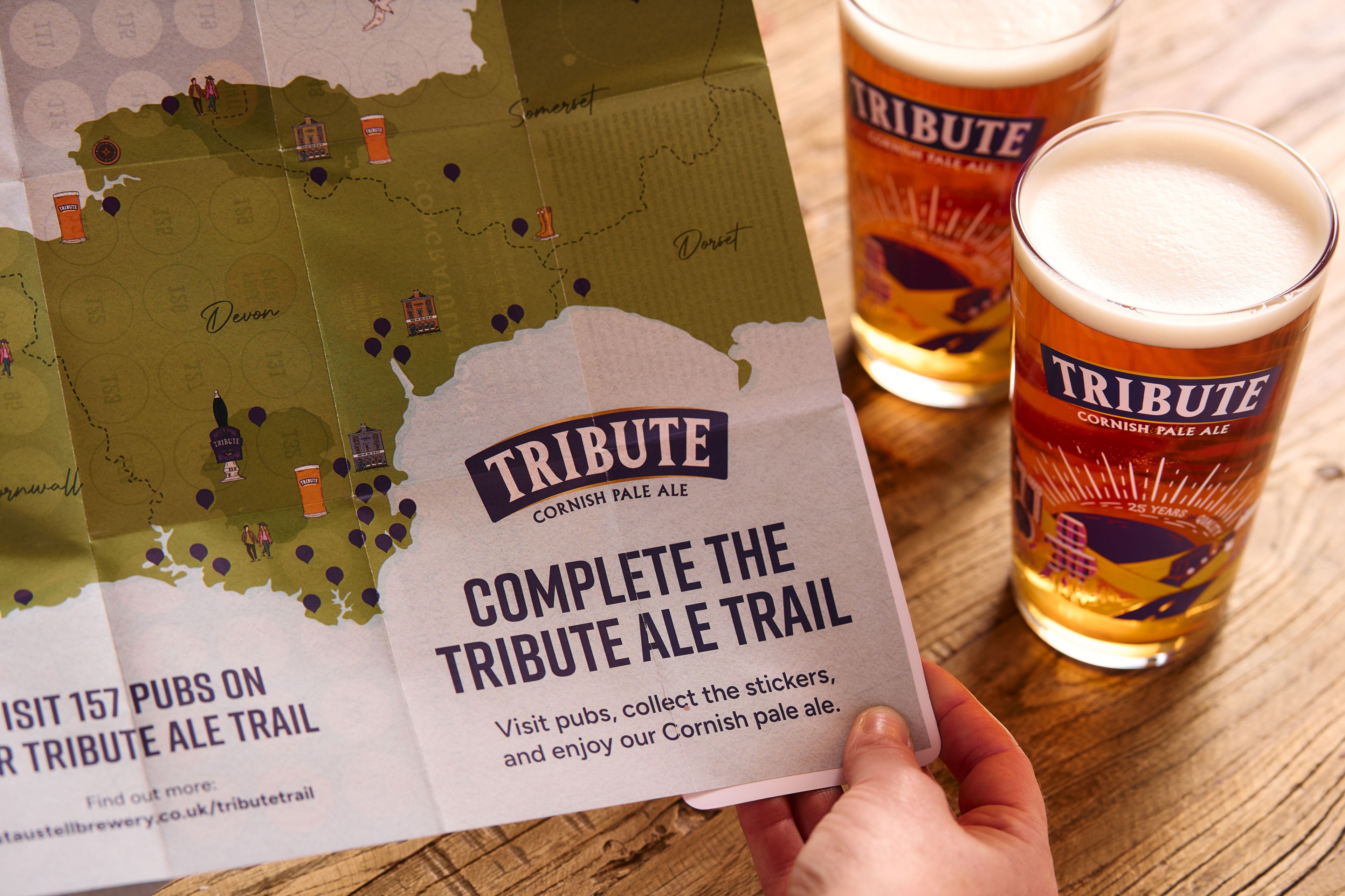 Tribute Ale Trail map held in hands